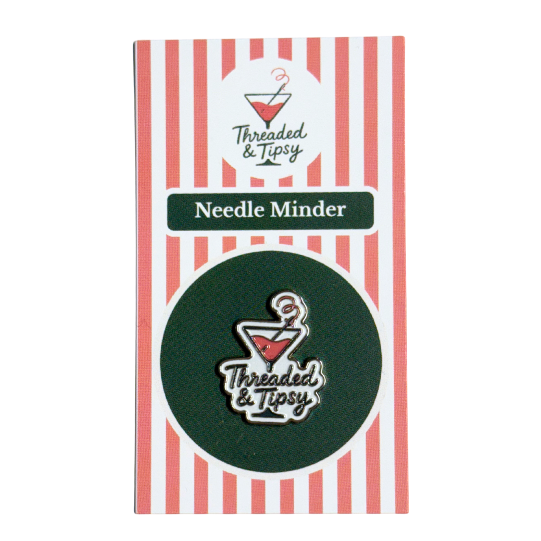 Threaded & Tipsy needle minder with striped packaging