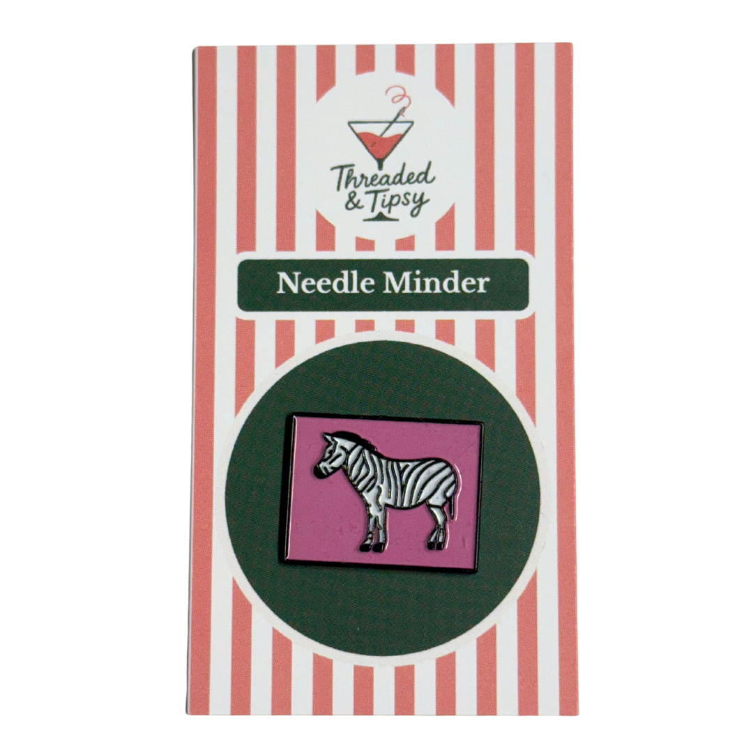 Zebra needle minder on striped packaging with &