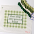 Needlepoint Kits of Green and white braided threads with a checkered mat and text on a white background