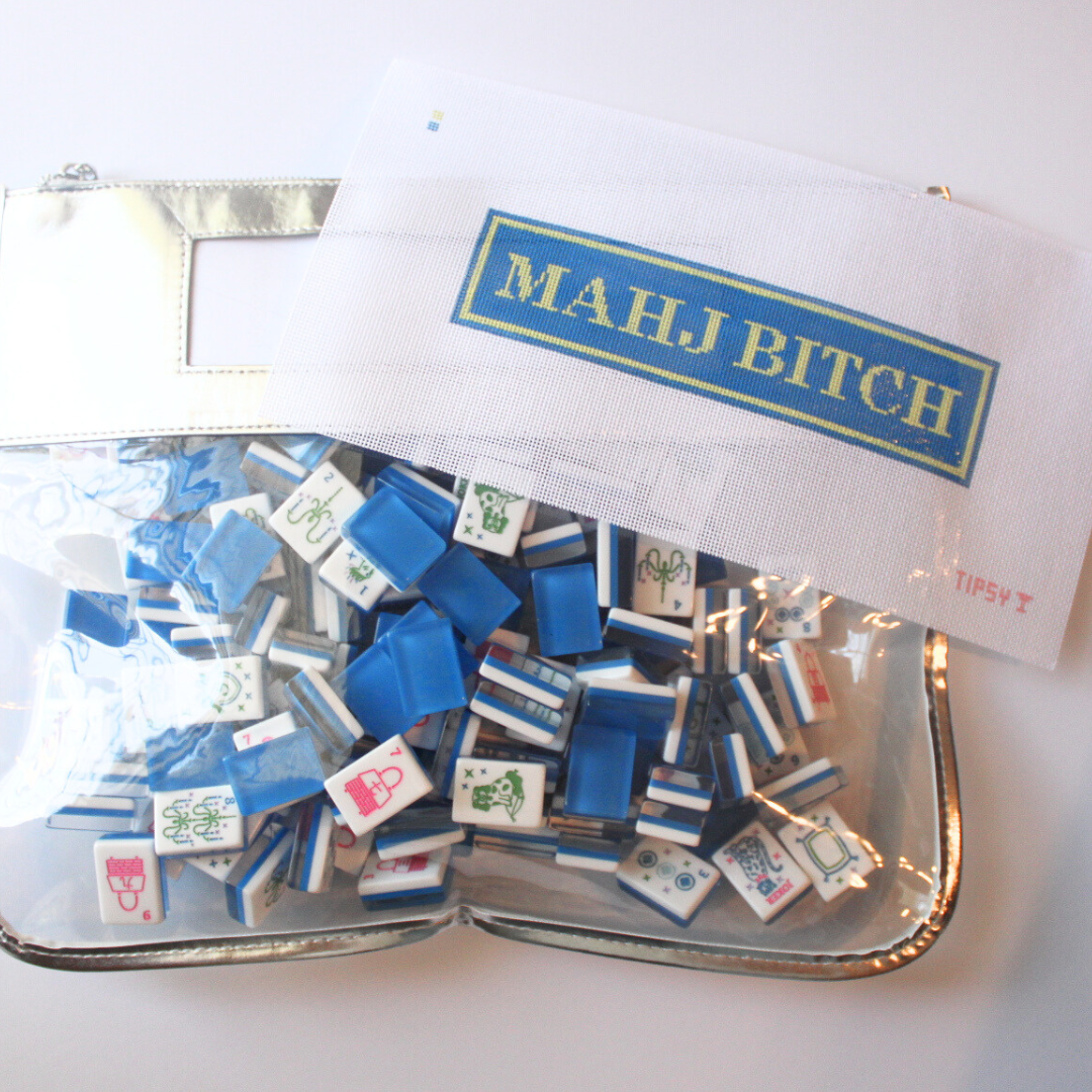 Small pouch with mini mahjong tiles and a needlepoint canvas with &
