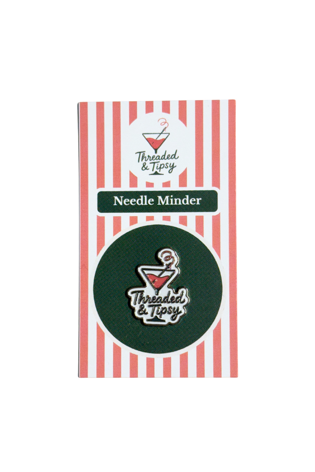 Threaded & Tipsy needle minder with striped packaging
