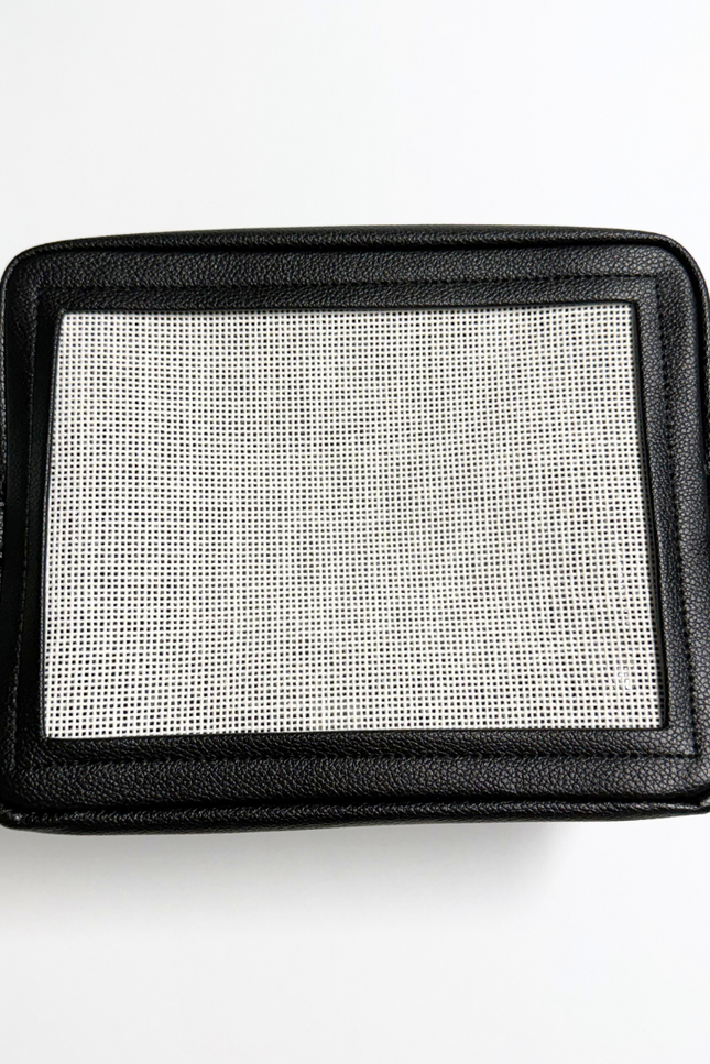 black stitchable needlepoint kit and pouch from Threaded & Tipsy