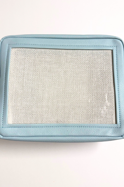 light blue stitchable needlepoint pouch from Threaded & Tipsy 