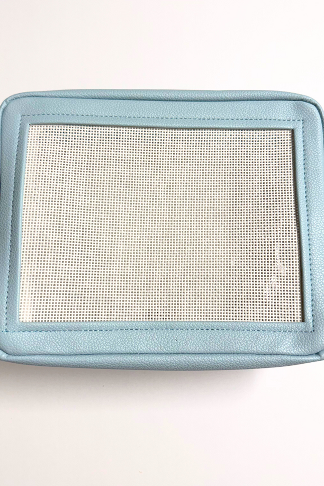 light blue stitchable needlepoint pouch from Threaded & Tipsy 
