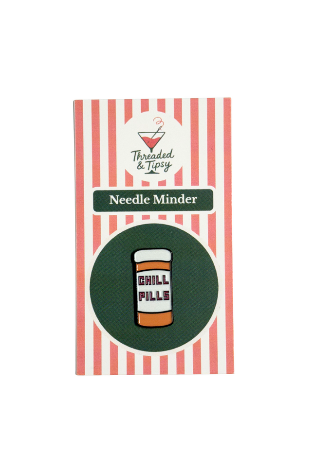 needle minder with 'Chill Pills' design on a striped background, branded as 'Threaded & Tipsy'.