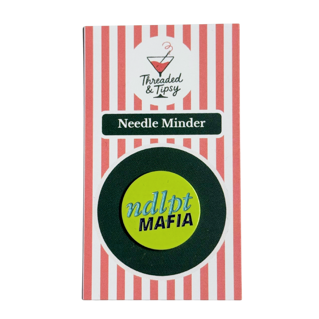 Needle Minder with striped packaging on a white background