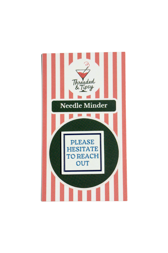 Packaged product with red and white striped design and text 'Please Hesitate to Reach Out'.