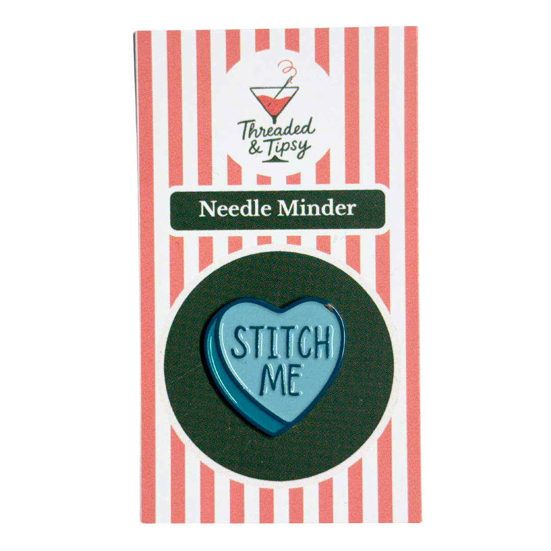 Heart-shaped needle minder with &