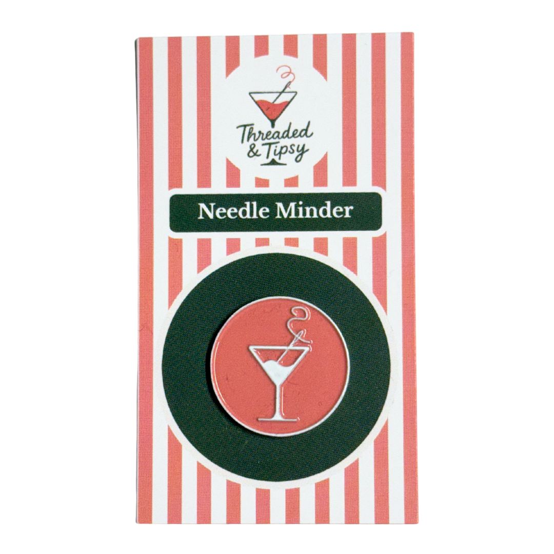 Needle Minder with striped packaging on a white background
